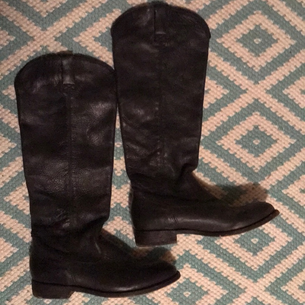 Tall black leather boots